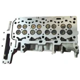 Overhead view of a genuine BMW 2.0 diesel bare cylinder head, fully skimmed and visually inspected for cracks between the valve seats.