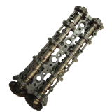 Top view of a salvaged BMW B47 camshaft carrier, complete with twin camshafts, retaining caps, and original Torx bolts secured in place.