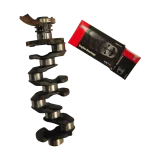 Full view of a genuine used BMW B47 engine crankshaft alongside a box of fresh engine bearings, ready for a bottom end rebuild.