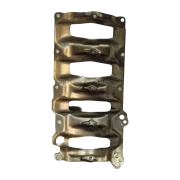 Front facing view of a genuine used BMW B47 exhaust manifold heat shield, showing the four exhaust port cutouts and mounting holes.