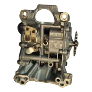 Underside view of a salvaged BMW B47 oil pump, showing the internal balance shaft gears and the original SHW casting marks.