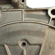 Close up of the factory dot matrix casting numbers and date stamp grid on a genuine aluminium BMW B47 timing chain cover.