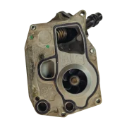 Rear view of a genuine used BMW B47 water pump showing the metal impeller and gasket channels, visually inspected and structurally sound.