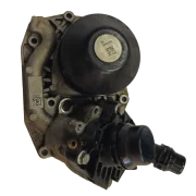 Front profile of a genuine BMW B47 water pump and thermostat assembly, showing the factory Saleri casting and pulley sticker with part number 8514458.