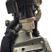 Close up of the factory identification stamp on a BMW B47 EGR valve, showing part number 8513132 and the BMW logo.