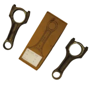 Two genuine used BMW connecting rods for M47/M57 diesel engines, pictured alongside one new original box with part number 11247807345 visible.