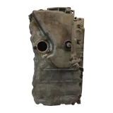 Outside profile of a salvaged BMW engine oil sump pan, showing the oil level sensor port, drain plug and factory casting marks 139920 10.