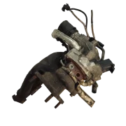 Top profile of a genuine used KKK turbocharger integrated with the exhaust manifold for VW and Audi 2.0 TDI engines, ready for installation